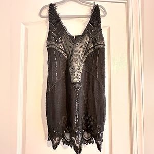 Free people black beaded mini strapless lace dress size small NWOT. Side zipper
